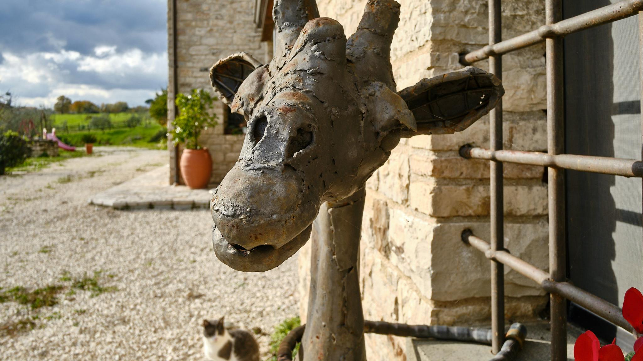 This iron giraffe from Kenya is located outside the country chalet of Tenuta le Pietre.